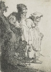 Beggar man and woman behind a bank