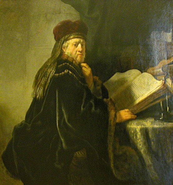 A Scholar Seated at a Table with Books